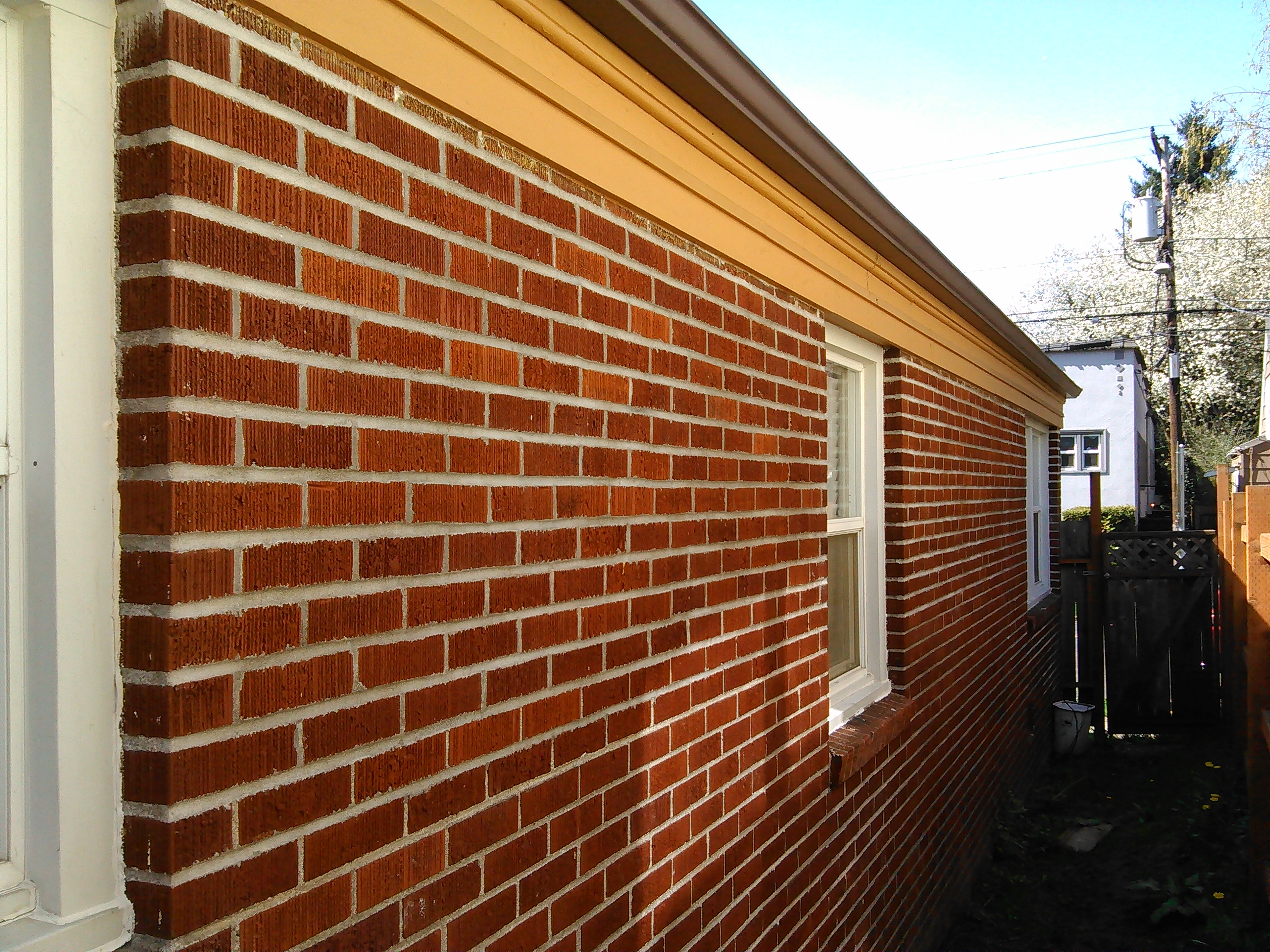 Masonry Repair After Picture of Tuckpointing Brick Masonry Wall